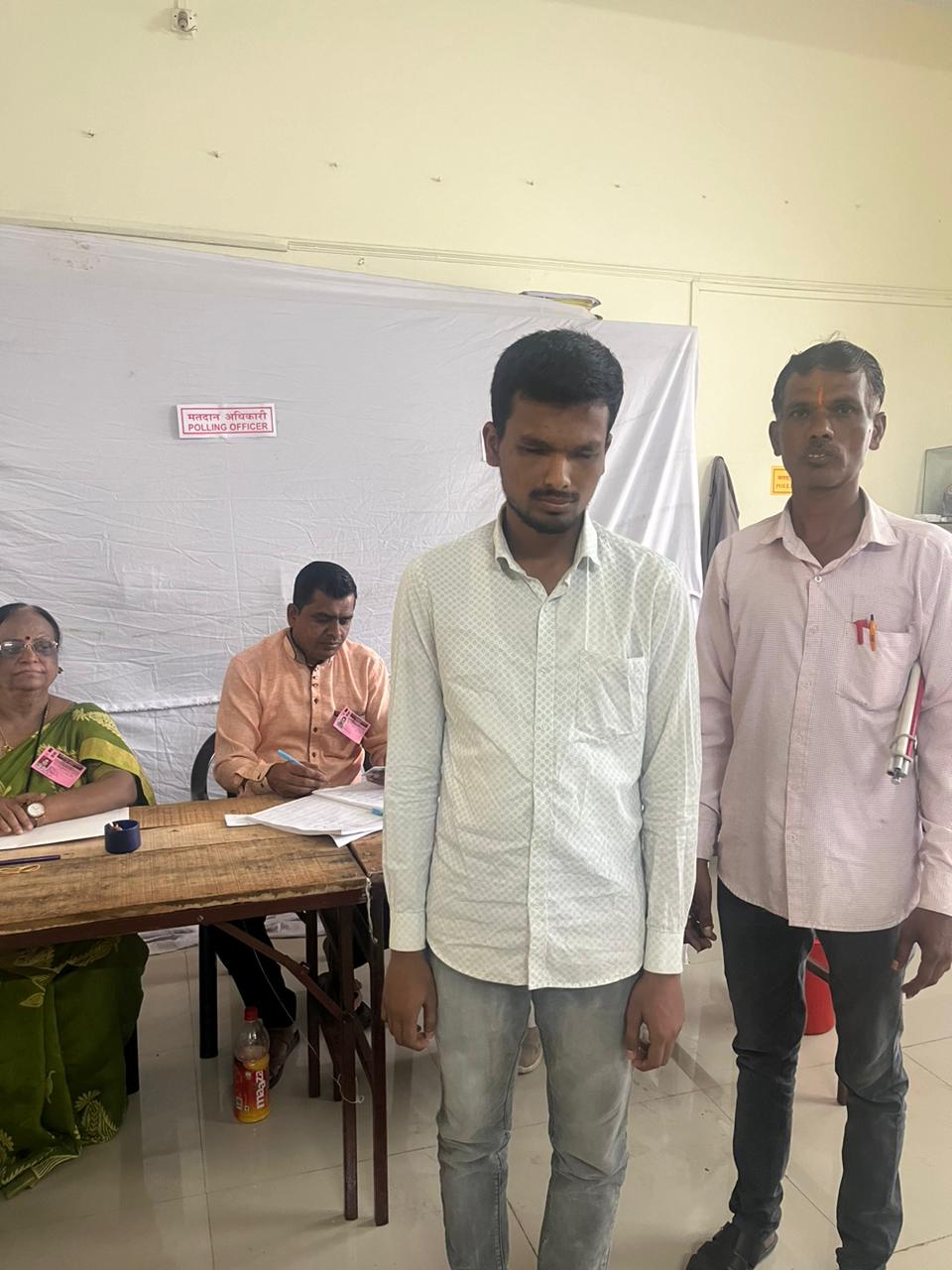 A visually impaired voter in Pimpri